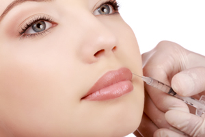Woman receiving injectable filler